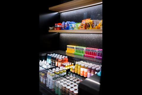 Interior of Peloton store, Covent Garden, London, showing food and drink products on display